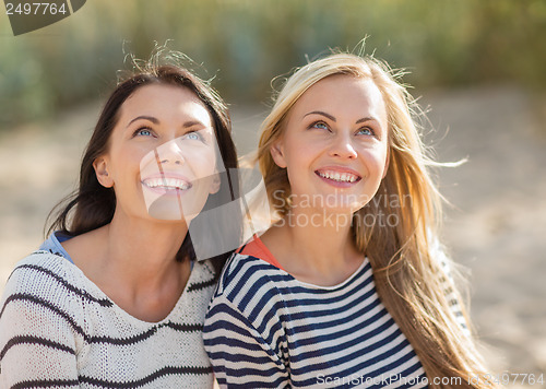 Image of beautiful teenage girls or young women having fun