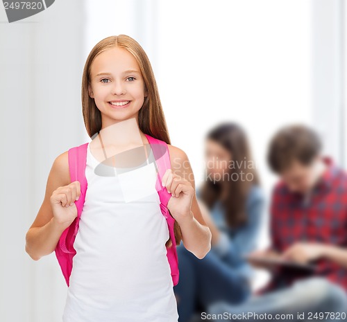 Image of smiling teenage girl in blank white tank top
