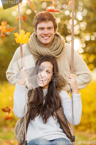 Image of romantic couple in the autumn park