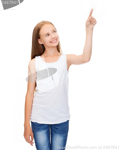 Image of girl in blank white shirt pointing to something