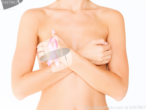 Image of naked woman with breast cancer awareness ribbon