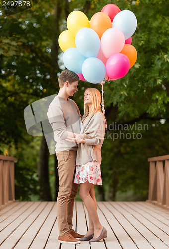 Image of couple with colorful balloons