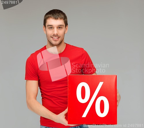 Image of man in shirt with red percent sale sign