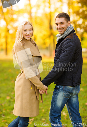 Image of romantic couple in the autumn park