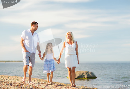 Image of happy family at the seaside