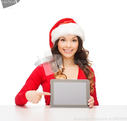 Image of woman in santa helper hat with tablet pc