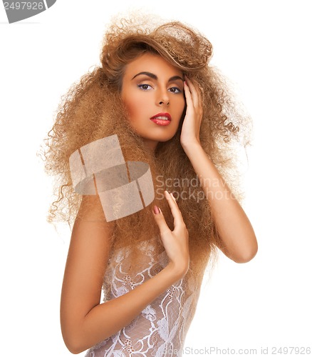 Image of woman with long curly hair