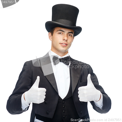 Image of magician in top hat showing thumbs up