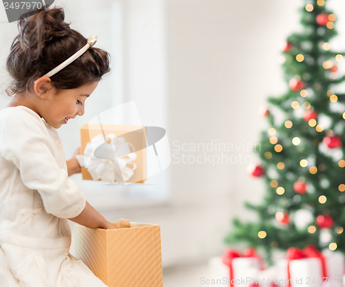 Image of happy child girl with gift box