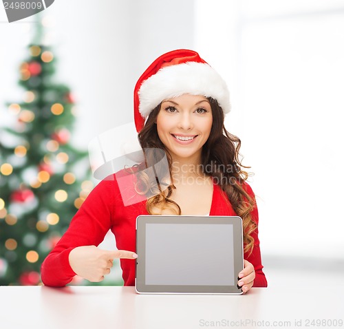 Image of woman in santa helper hat with tablet pc