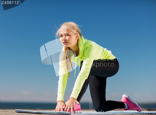 Image of woman doing sports outdoors