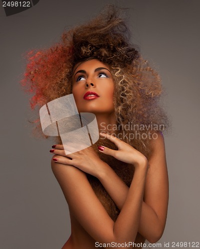 Image of woman with long curly hair