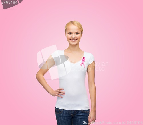 Image of woman in blank t-shirt with pink cancer ribbon