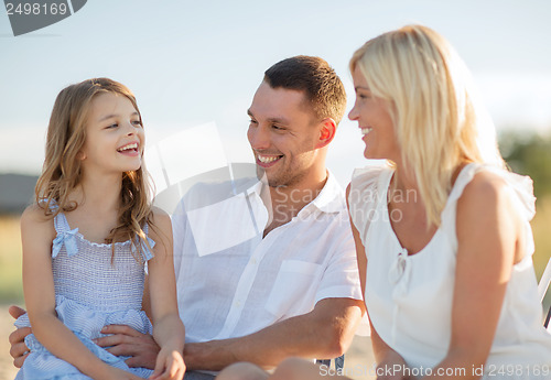 Image of happy family having a picnic