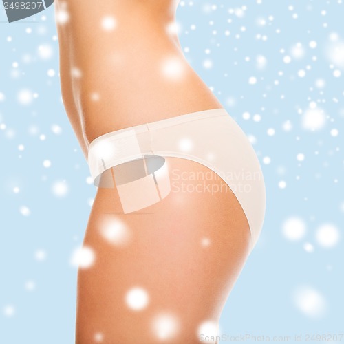 Image of woman in cotton underwear showing slimming concept