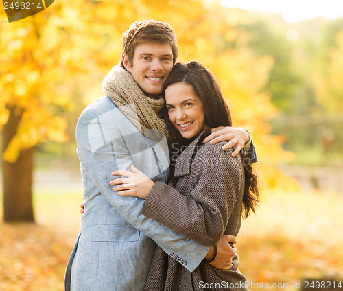 Image of romantic couple in the autumn park