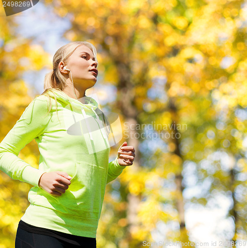 Image of woman doing running outdoors