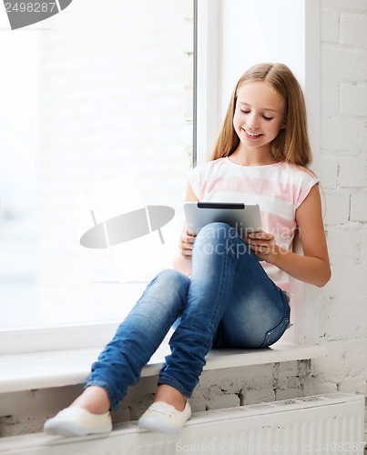 Image of girl with tablet pc at school