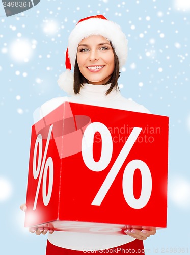 Image of woman in santa helper hat with percent sign