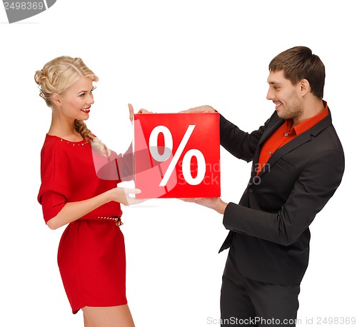 Image of woman and man with red percent sale sign