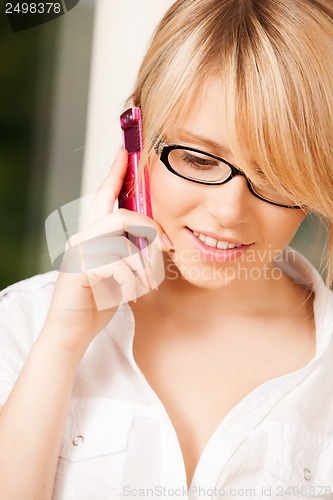 Image of teenage girl with cell phone calling