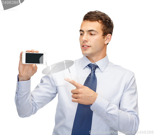 Image of buisnessman with blank screen smartphone