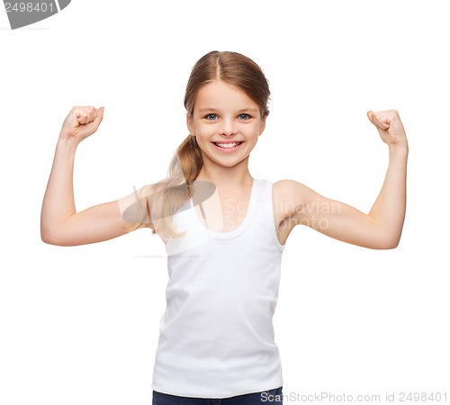 Image of teenage girl in blank white shirt showing muscles