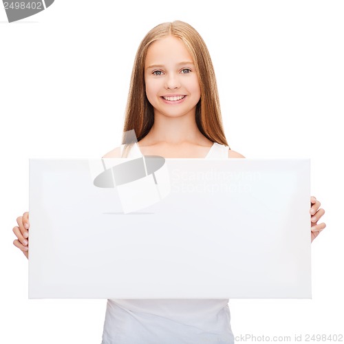 Image of little girl with blank white board