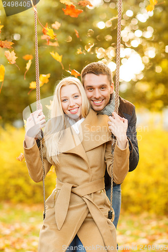 Image of romantic couple in the autumn park