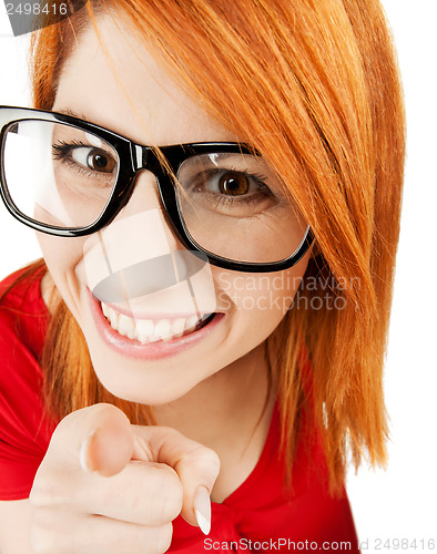 Image of woman in glasses pointing finger