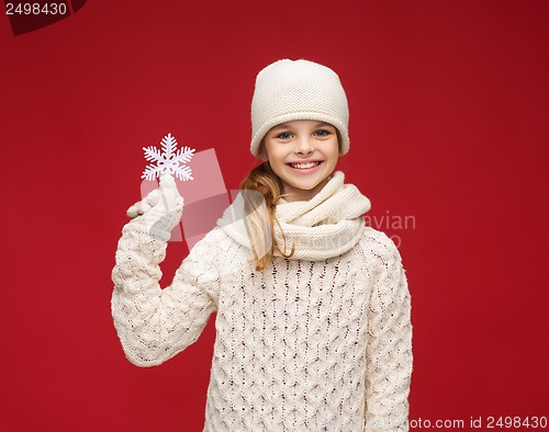 Image of girl with big snowflake