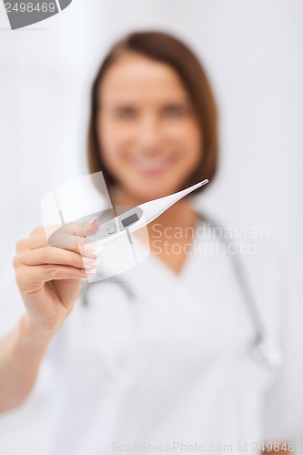 Image of doctor with thermometer and stethoscope