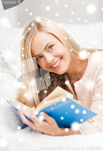 Image of woman reading book