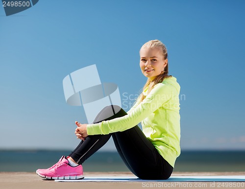 Image of woman doing sports outdoors