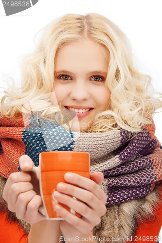 Image of teenage girl with tea or coffee mug