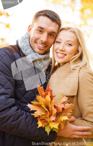 Image of romantic couple in the autumn park