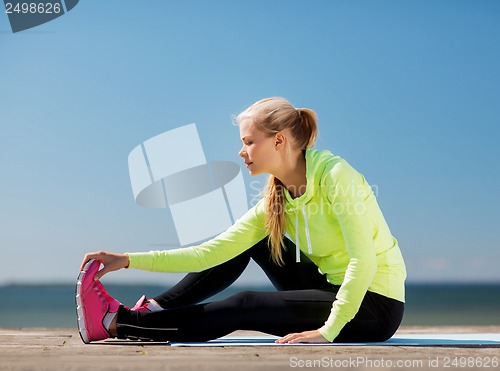 Image of woman doing sports outdoors