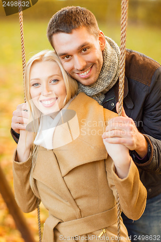 Image of romantic couple in the autumn park