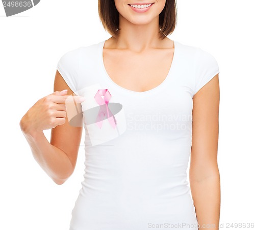 Image of woman in blank t-shirt with pink cancer ribbon