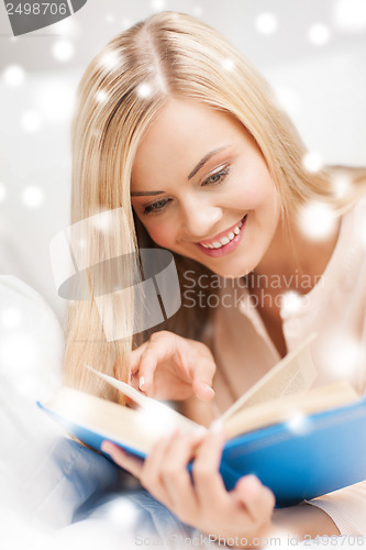 Image of woman reading book