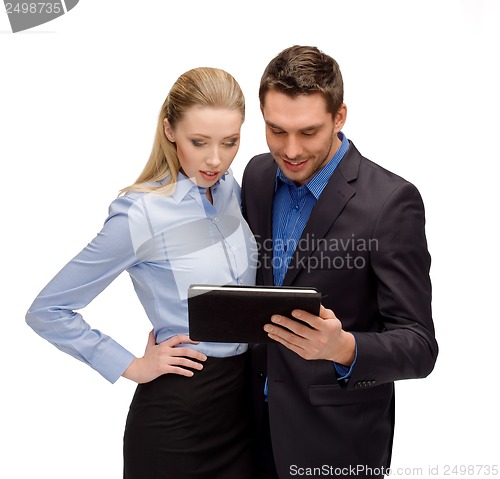 Image of businesswoman and businessman with tablet pc