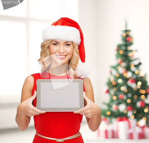 Image of woman in santa helper hat with tablet pc