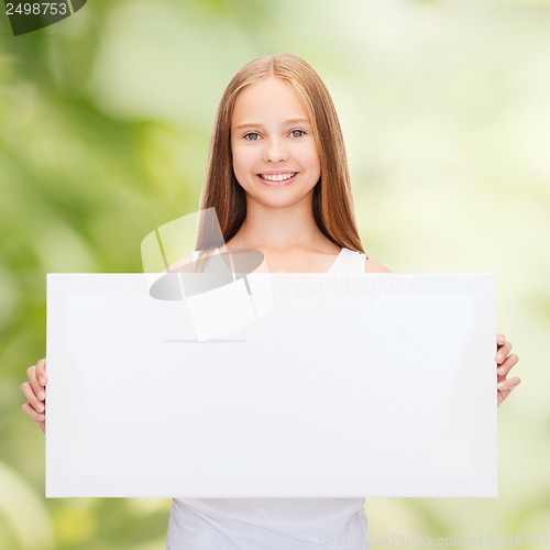 Image of little girl with blank white board