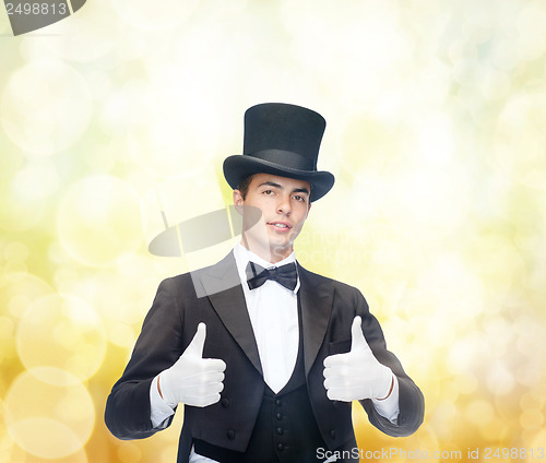 Image of magician in top hat showing thumbs up
