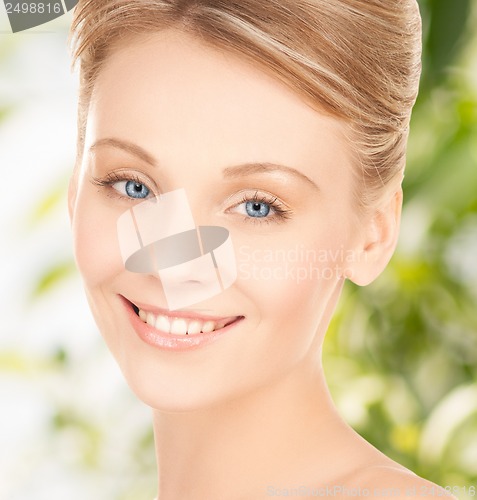 Image of beautiful woman with updo hair