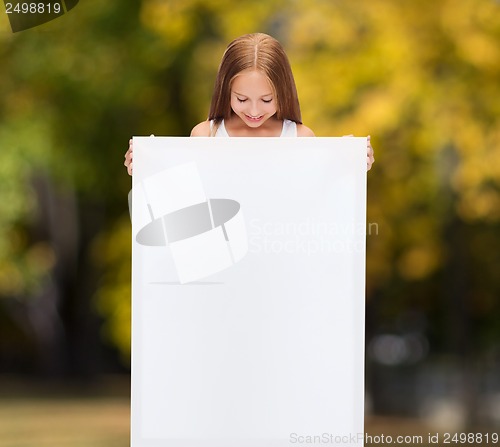 Image of little girl with blank white board