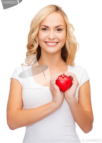 Image of woman in blank white shirt with small red heart