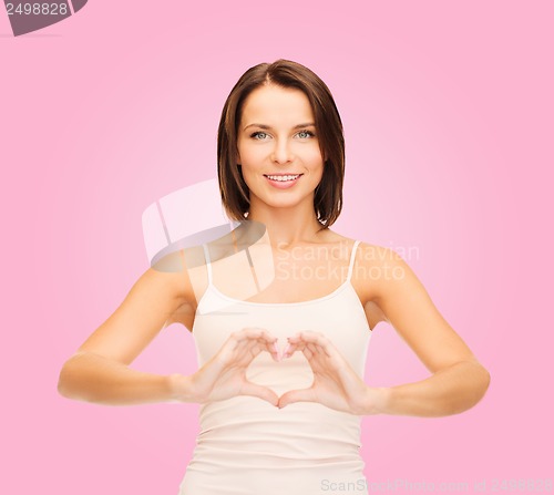 Image of woman forming heart shape