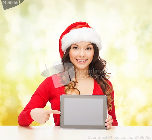 Image of woman in santa helper hat with tablet pc