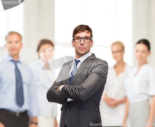 Image of attractive buisnessman or teacher in glasses